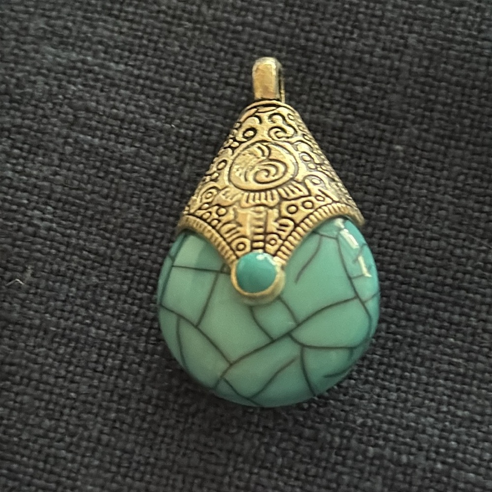 Turquoise teardrop shaped pendant from Nepal